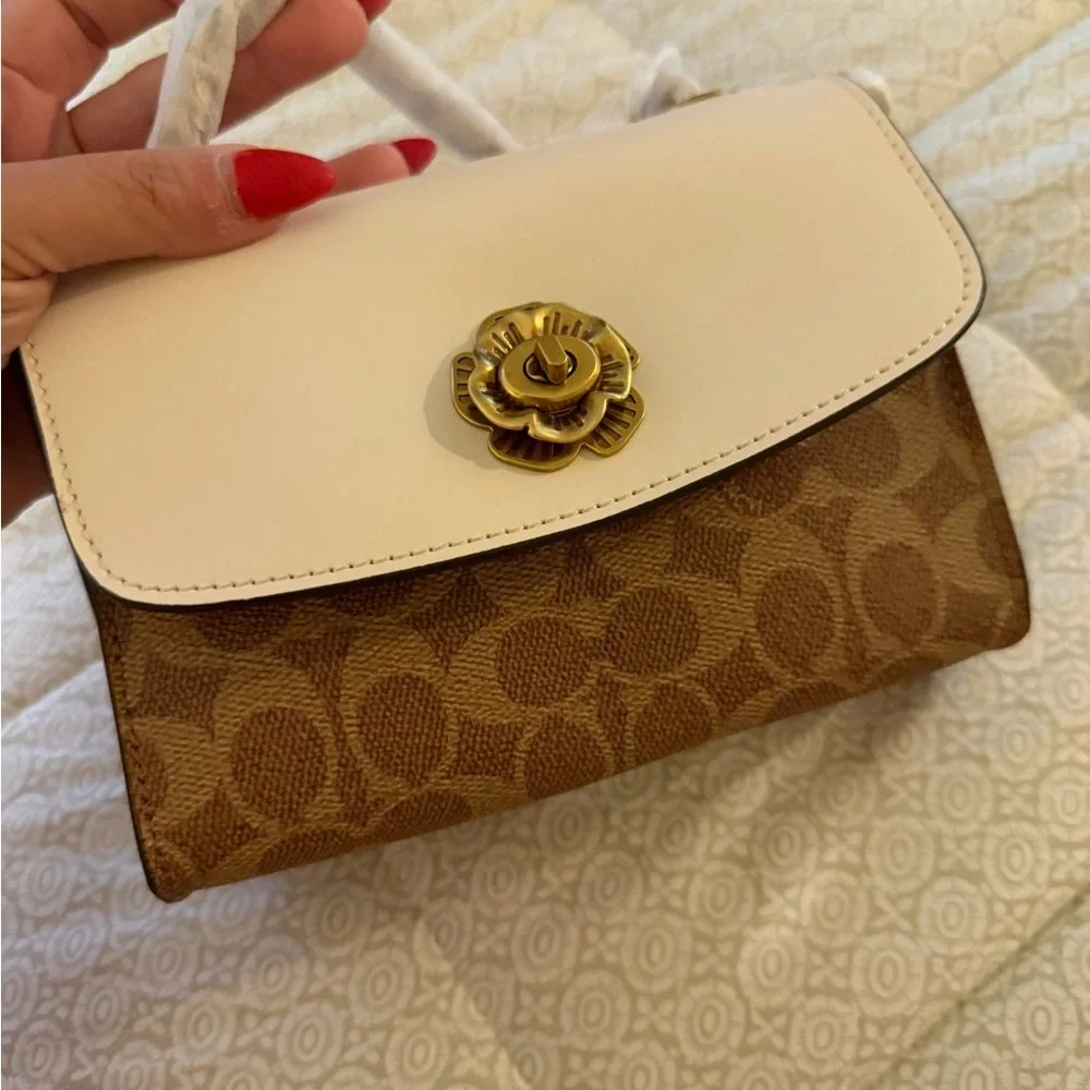 Coach Floral Accent Cream and Brown Clutch Parker 18